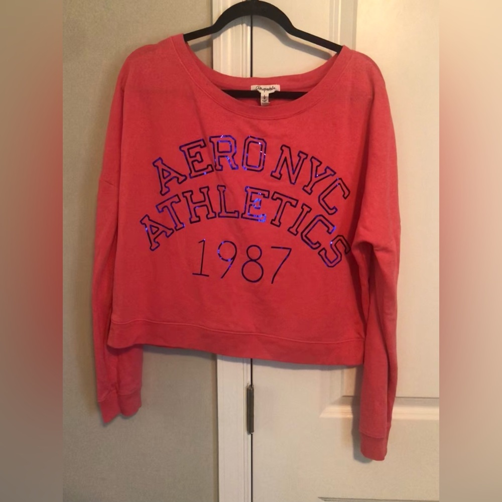 Aeropostale oversized sweatshirt. Coral color with metallic blue lettering.